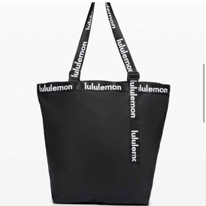 Lulu Lemon “The rest is written” black and white tote - gently used